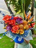 Flower arrangement "Sunset Glow" (includes hatbox)